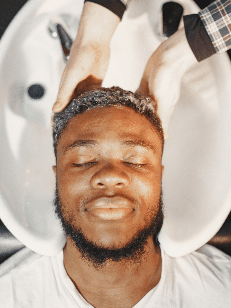 Man having hair wash in salon